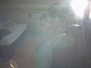 voyeurcam-julmodels-whitebed-6 webcam model stream image